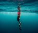 Snorkeller swimming at the surface in clear water